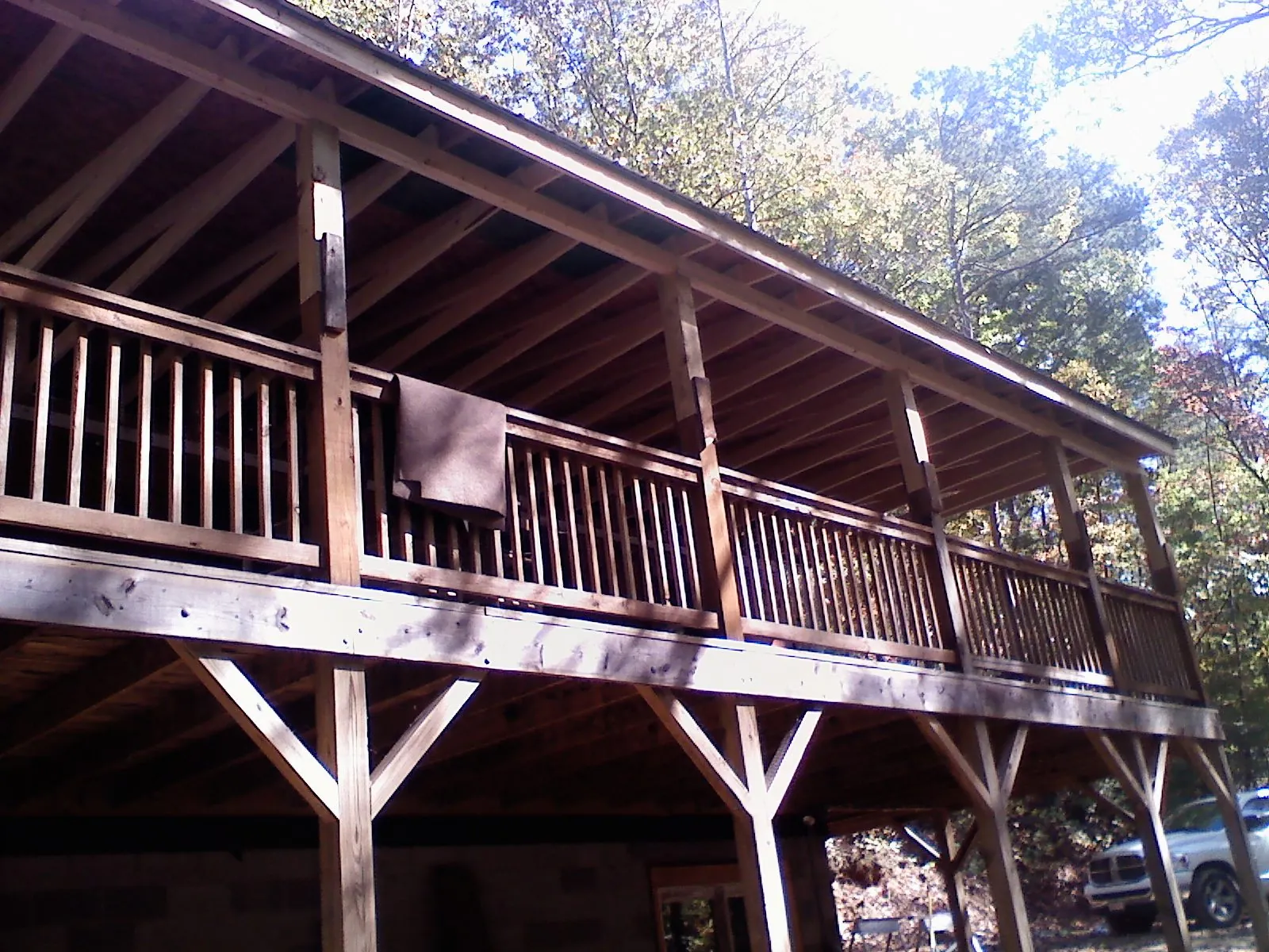Timber framing under a new elevated porch and deck — Roof Leak Repair in Vista by Roofing Brothers